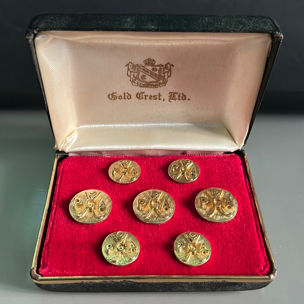 Set of Seven Gold Tone PGA Buttons - New Old Stock